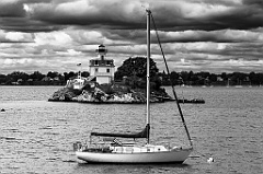 Storm Clouds Over Sailboat Moored by Pomham Rocks Lighthouse